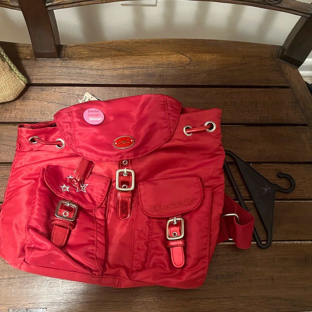 American Girl Bath And Bodyworks red backpack + doll clothing hanger